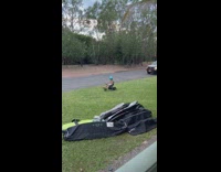 Kid Speeds Away from Police with Hoverboard Cart