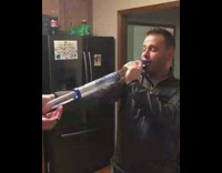 Guy shoots a beer gun into his mouth, it explodes