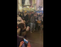 People in a scary devil with horns costume Halloween celebration