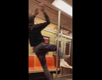 Guy spins and flips with train pole 