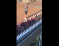 Guy grey sweater talks hold deck cards 