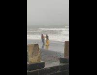 Two people yellow outfit WAP Dance rain music