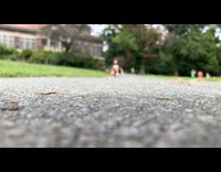 Ball rolls and hits camera slow motion