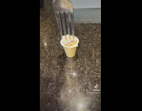 Woman shows fun way to put creamer on coffee