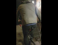 man in grey jacket bike downstairs