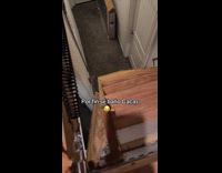 Woman on attic throw plastic with water