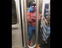 Two guys spiderman batman costume fight subway