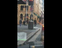 Two guys music video car blinker sidewalk