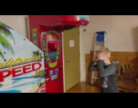 Boy punches the bag and scored one point