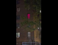 Flashing colors in apartment window 