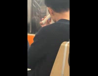 Guy does facial massage on train ride