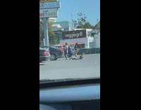 Girl lay down pull ankles parking lot