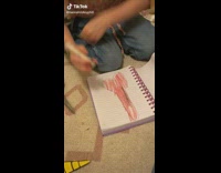 Girl draws scissors 