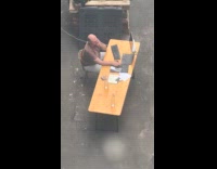 Man works at garage with complete equipment