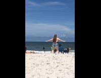 Woman black top denim shorts dance beach chairs