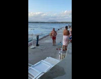 Woman brown beach dress dance near ocean