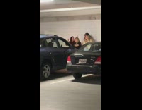 Four girls parking garage dancing camera on phone