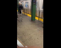 Man in subway wear chips bag outfit