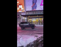 Girl wears dress during snowstorm for photos 