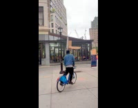 People doing random stuff on sidewalk