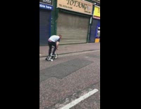 Guy rides mini tricycle down the street and face plants