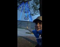 Collab Bitch MP - Guy in blue shirt pretends to control ride swing