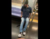 Guy exercises at train stop 