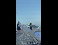 Woman white off shoulder dance beach chair