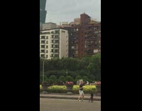 Man tiktok dance video Taipei 101 building