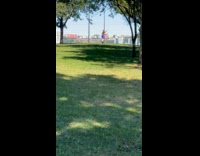 Man shirtless practice spin with axe failed