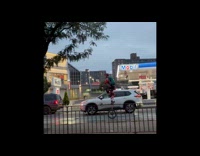 Collab WINY - Man helmet lights ride tall unicycle street