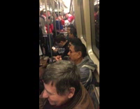 Man bald picking nose subway packed