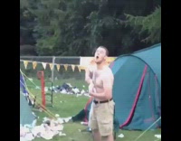 shirtless guy gets beer spilled on himself 