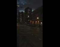 Peaceful protest people march sidewalk at night 