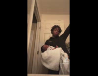 Man Dances with Hands Up so Did Baby