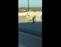 Woman parking garage roof bikini picture