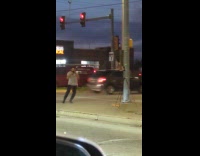 Man workout video with tripod on street