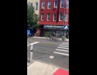 Man ride tandem bike with skeleton family