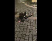 Woman tries to jump over sign falls on face 