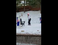 Girl films tiktok dance alone snow mountain 