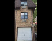 Electric car charging next to apartment 