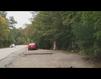 Woman witch costume selfie trees red car