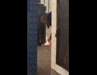 Man light fire in subway to warm himself