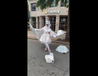 Woman in white dress costume for event