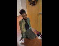 Guy walks into room crouched down small steps