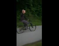 Man ride bike video shoot friend film also