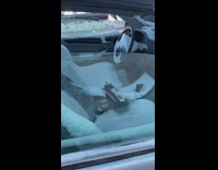 Inside of car is covered in snow