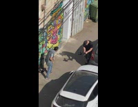 Guy grey hoodie shoot MV street graffiti