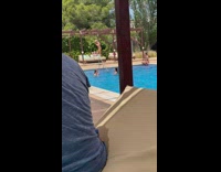 Woman in bikini lie down at the sunbed