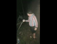 Guy hits can against head sprays beer 